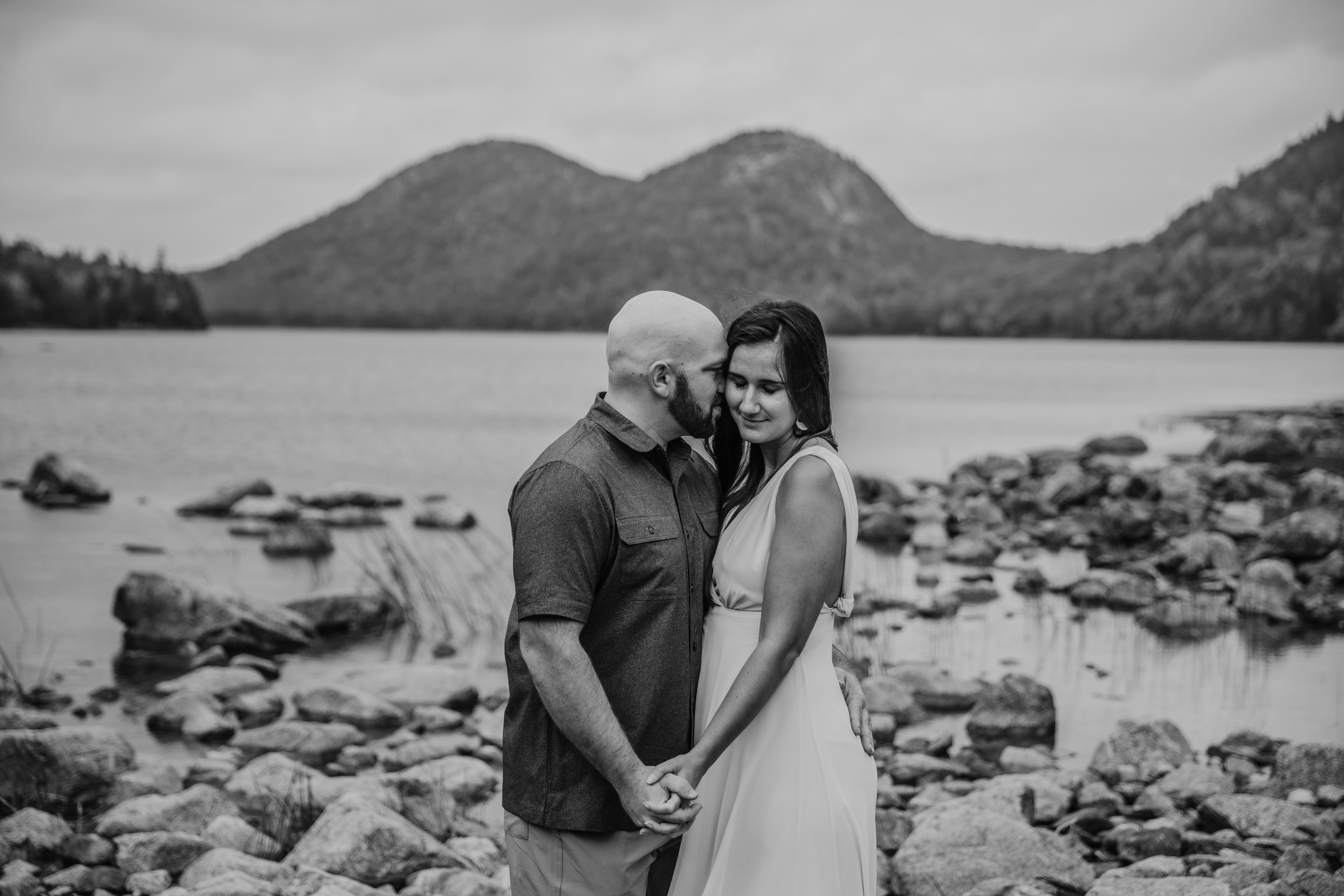 Young couple in fancy, dressy, luxury dress black and white photo intimate couple in Bar Harbor Maine at Jordan Pond in Acadia National Park Emily Leonard Photography