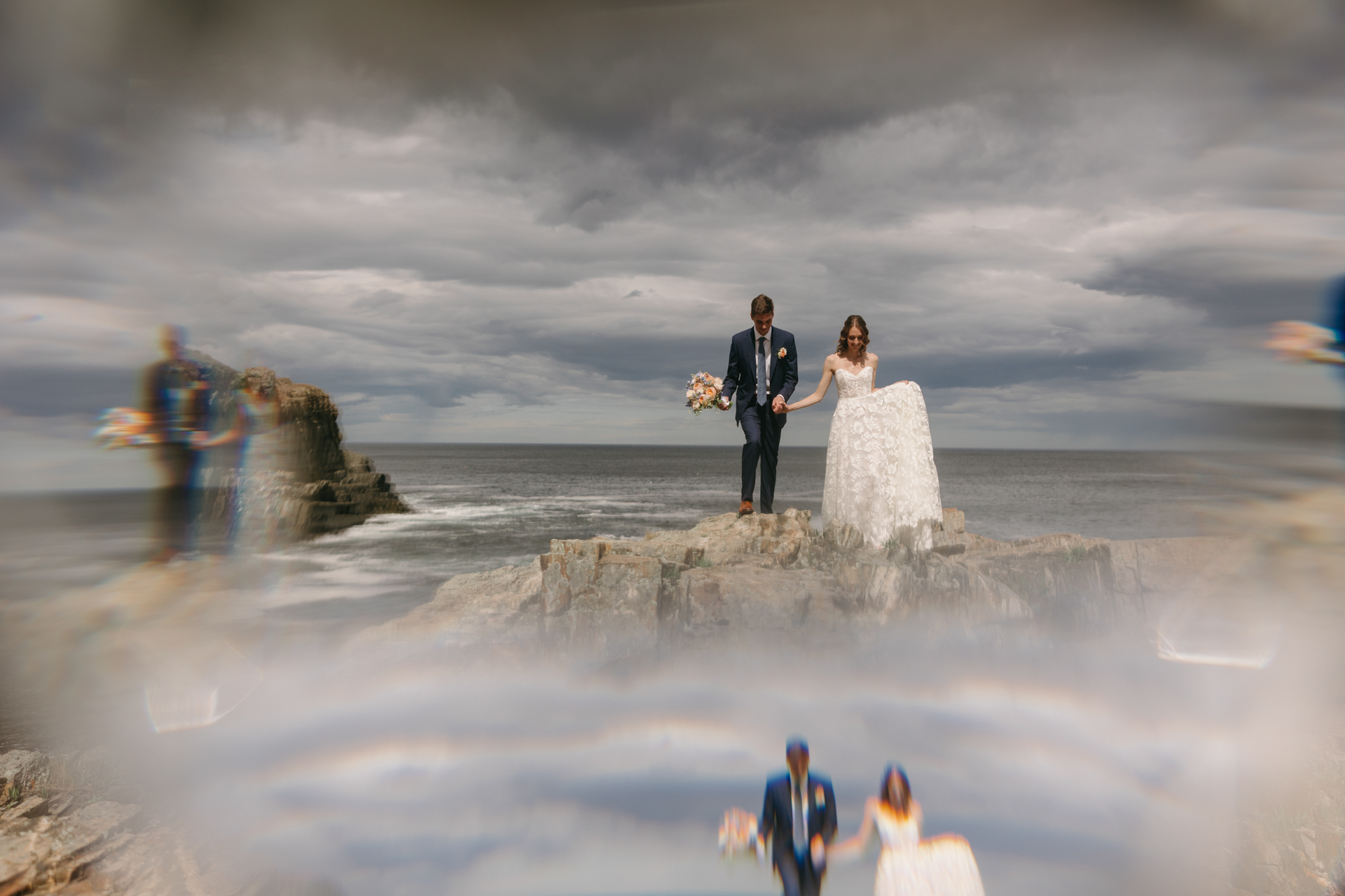 the first look on the cliffs at cliff house maine wedding venue in york maine 