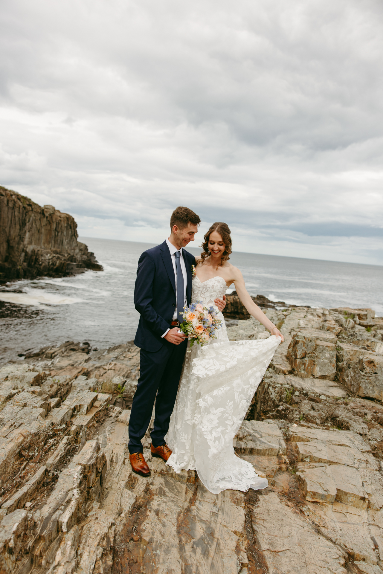 couple portraits at the cliff house wedding venue in york maine 