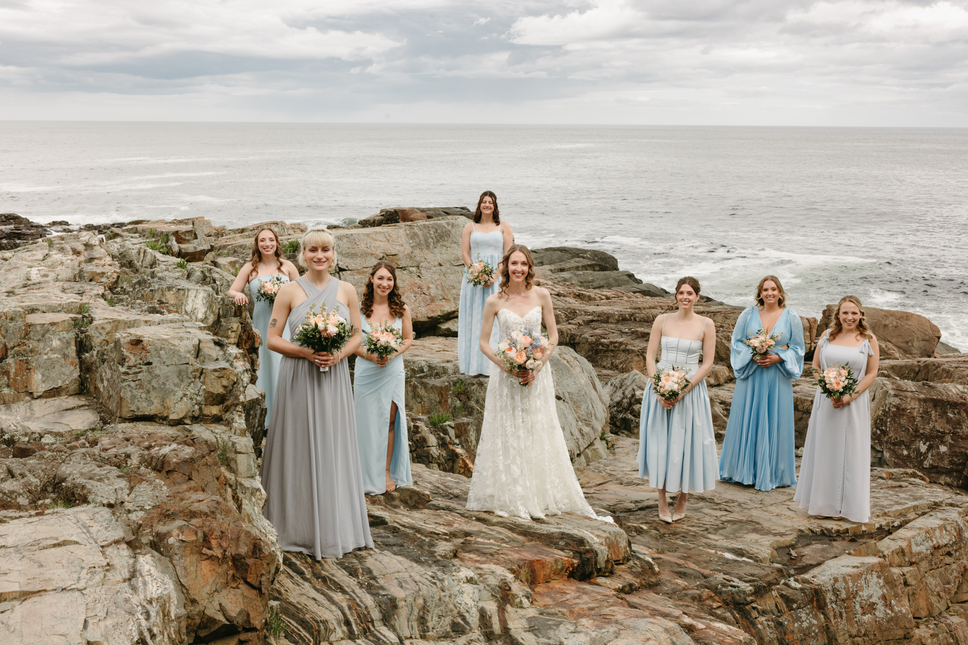 bridal portrait on the cliffs at the cliff house in maine 