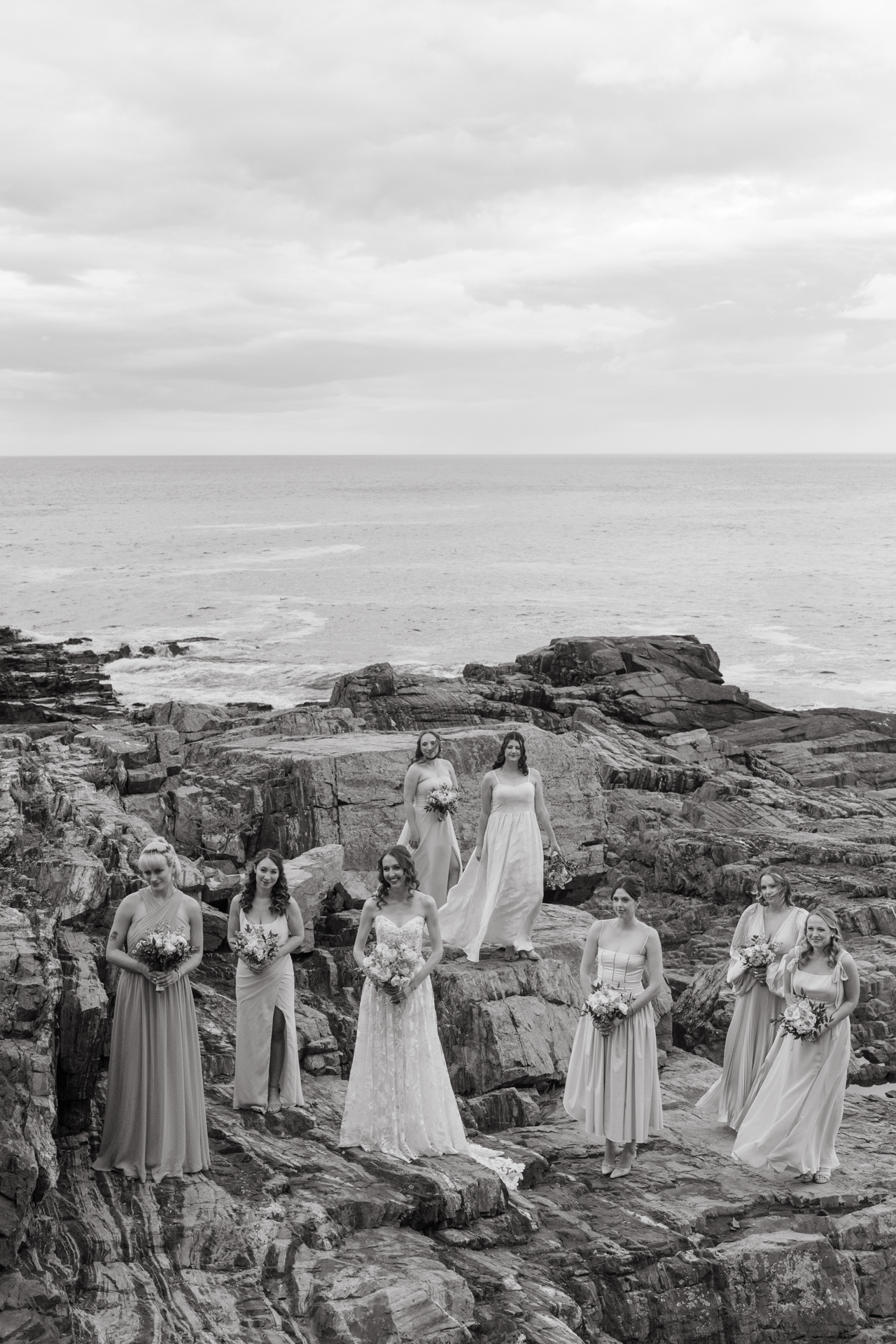bridal portrait on the cliffs at the cliff house in maine 
