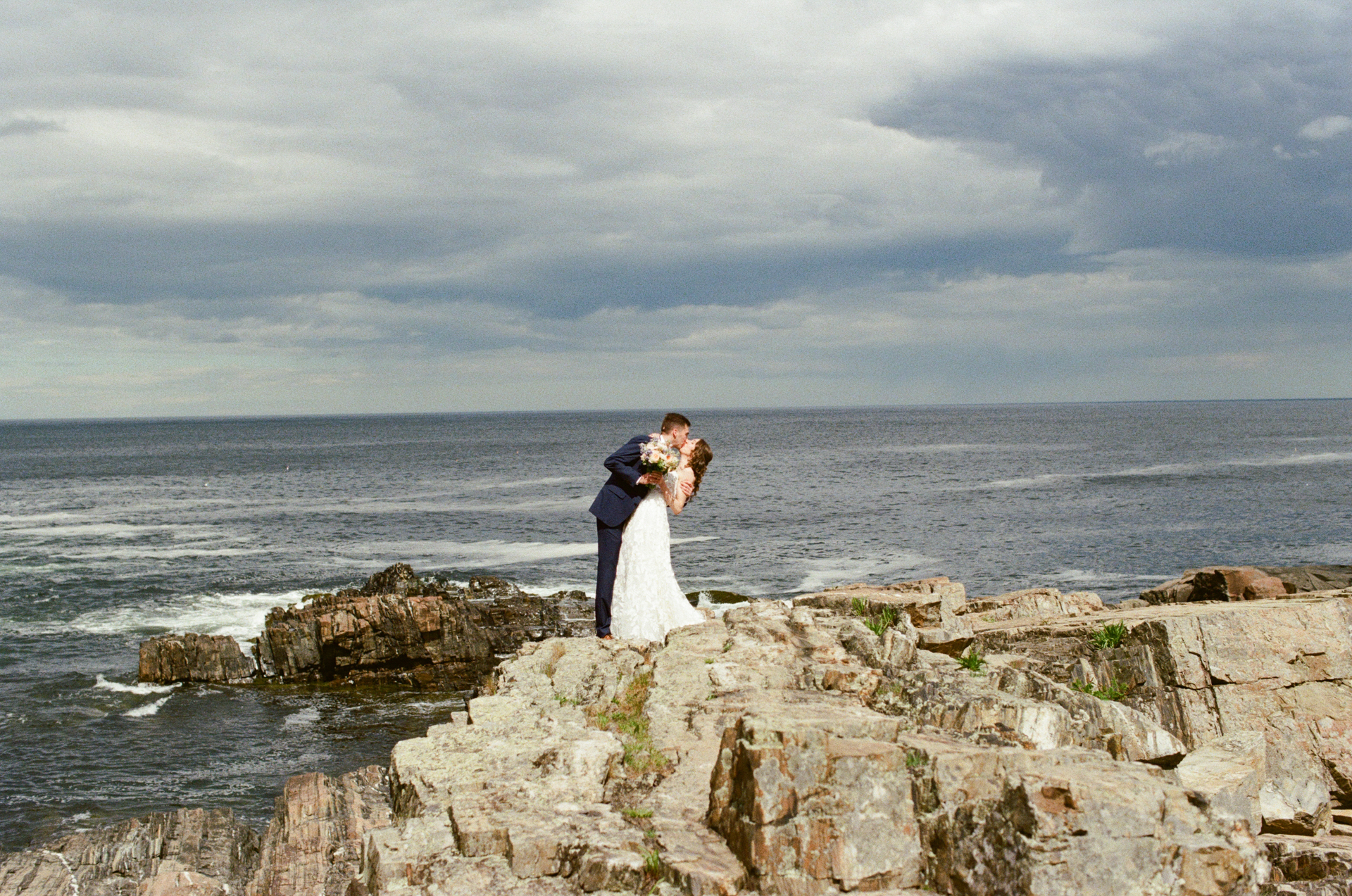 couple portraits at the cliff house wedding venue in york maine on 35mm film 