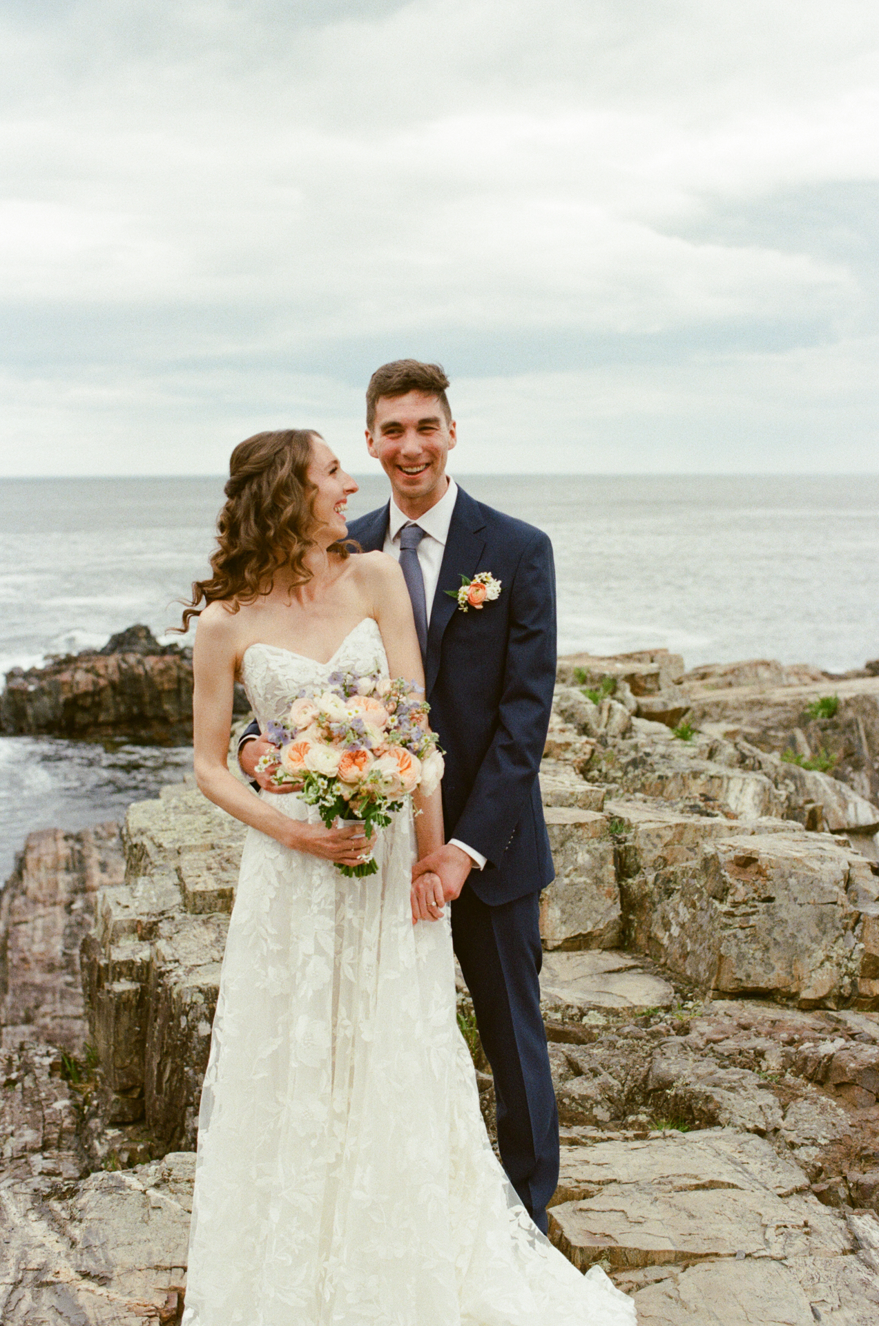 couple portraits at the cliff house wedding venue in york maine on 35mm film 