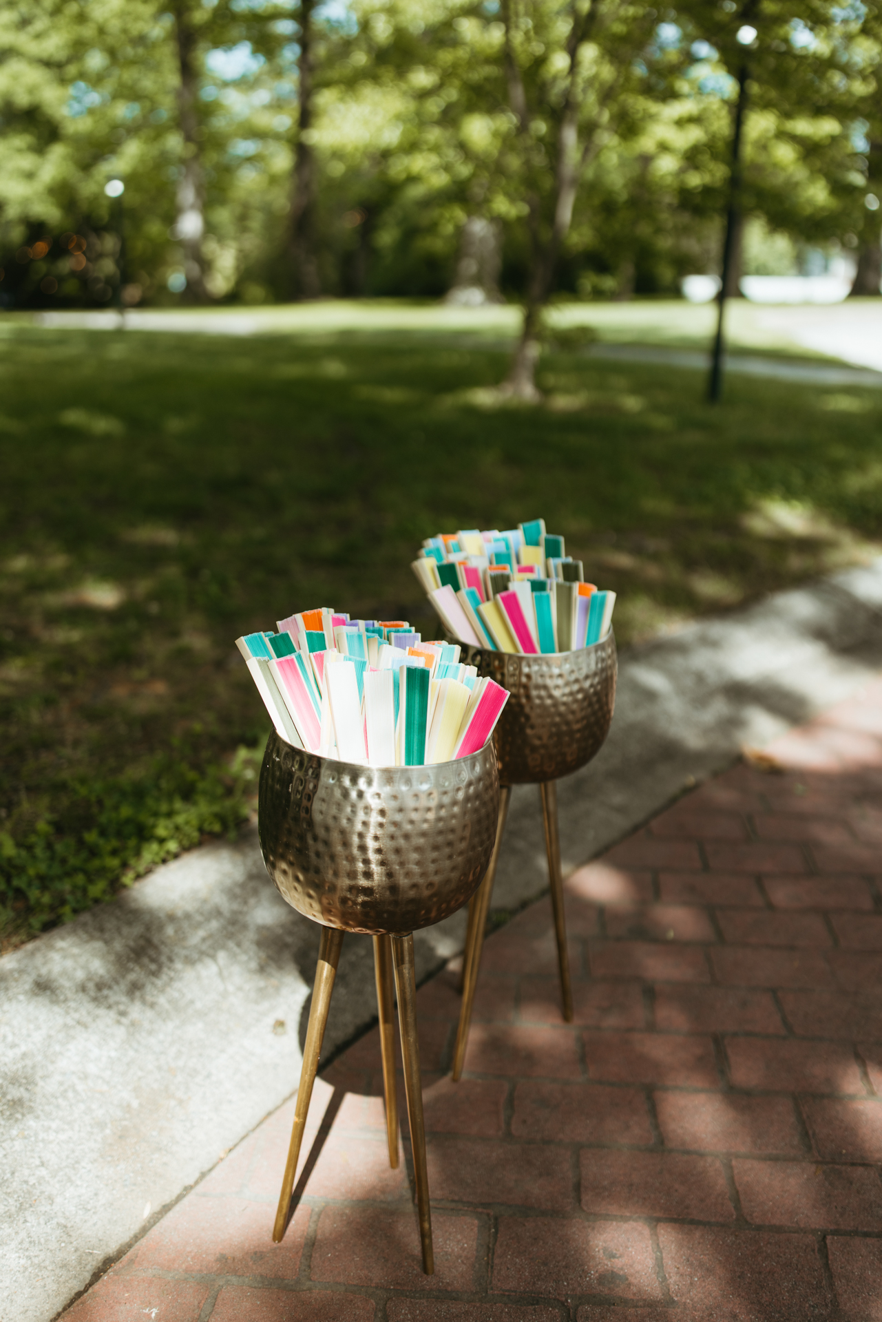 handheld foldable fans for guests at a wedding colorful rainbow