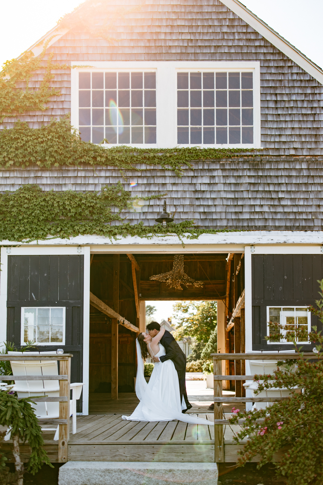 Live Well Farm Wedding Portrait in front of the barn at Live Well Farm in Harpswell Maine