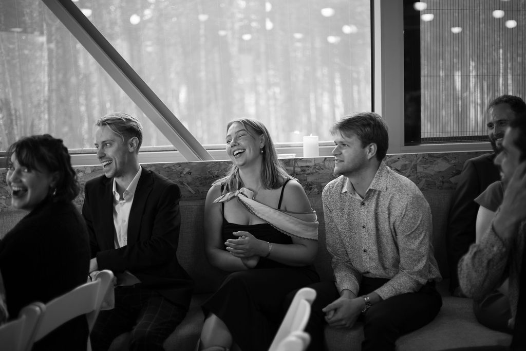 candid black and white guest reaction photo at Saddleback Mountain Ski Resort during wedding ceremony 