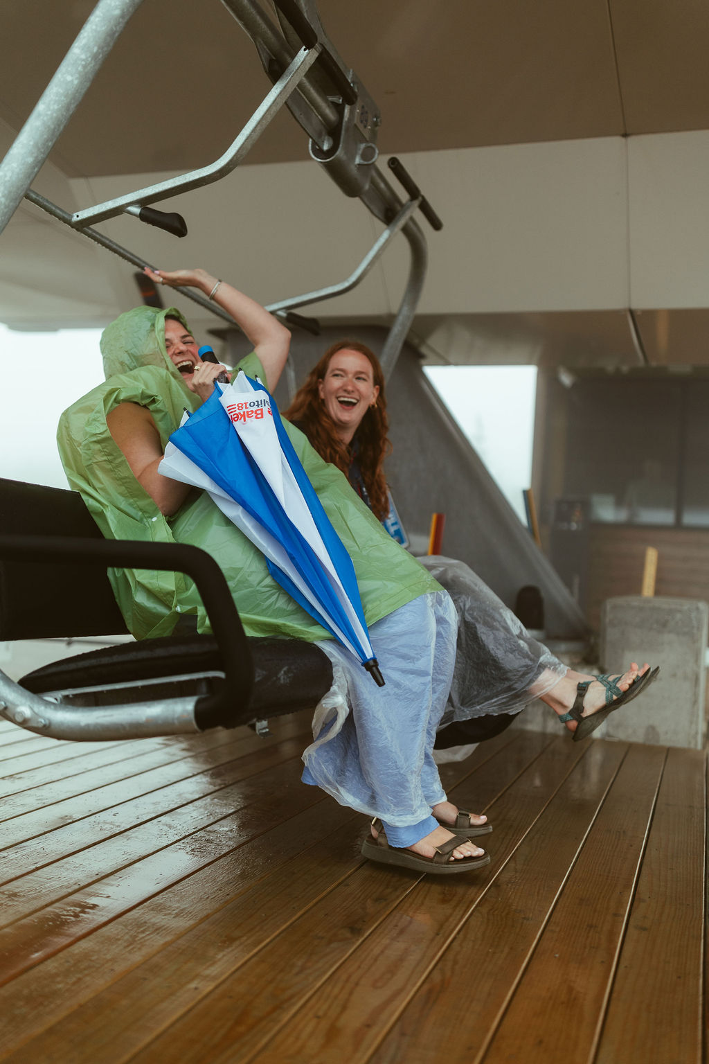 Wedding guests riding ski lift at Saddleback Mountain Maine Wedding 