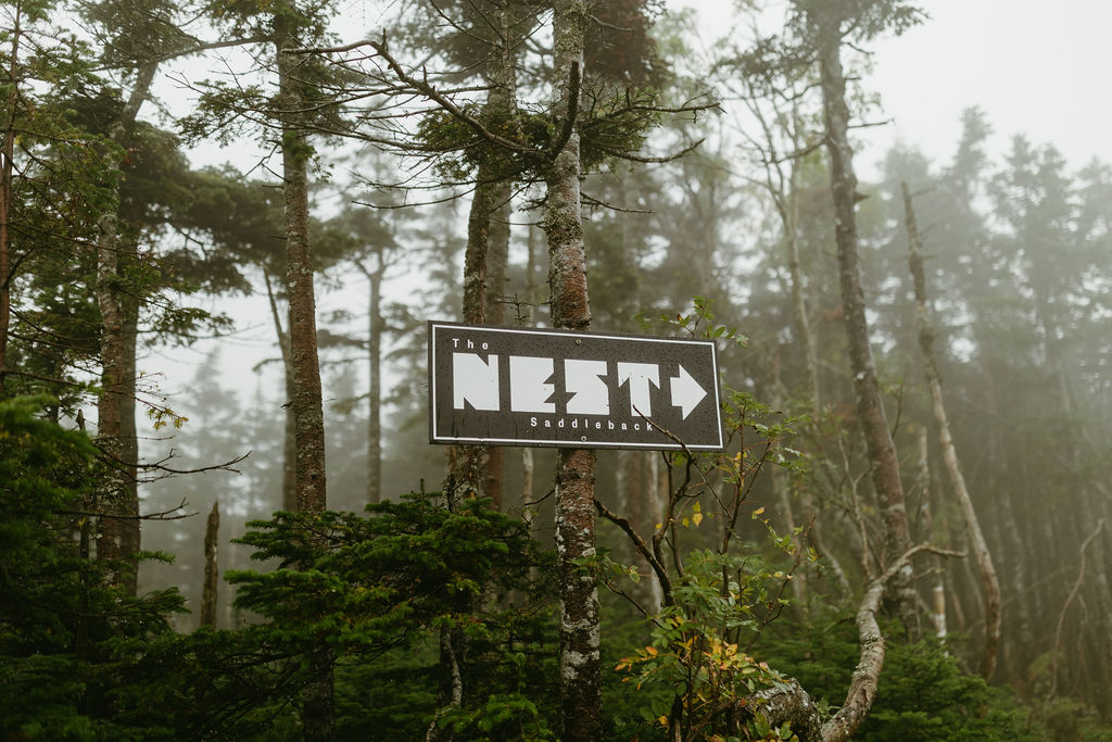 The Nest sign at the top of Saddleback Mountain Wedding Venue